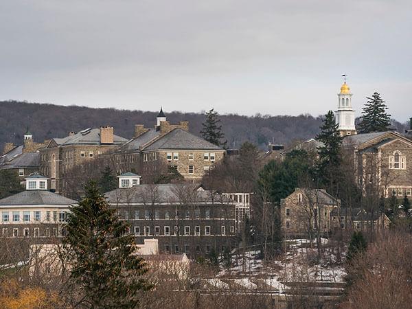 The Memorial Chapel tower stands out among other campus building on a winter day