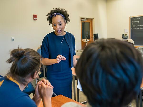 Associate Professor April Baptiste leads in a class discussion on Environmental Justice