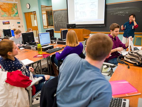 Professor Peter Klepeis lectures in the GIS computer lab on the second floor of the Ho Science Center.