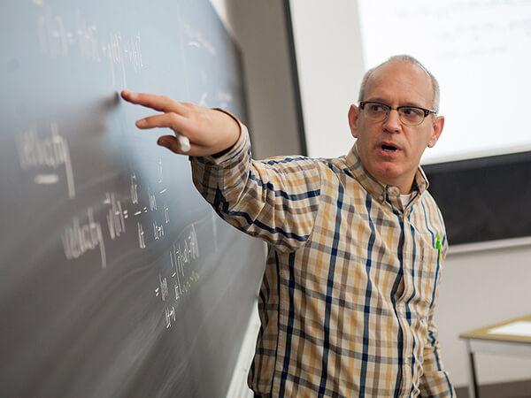 Professor and Department Chair Ken Valente leads a multivariable calculus class 