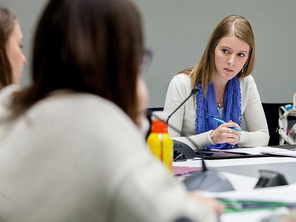 Colgate students participate in discussion during a seminar.