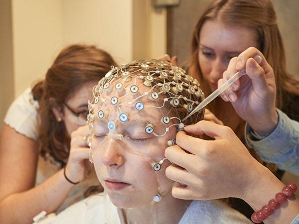 A student research subject fitted with an EEG net.