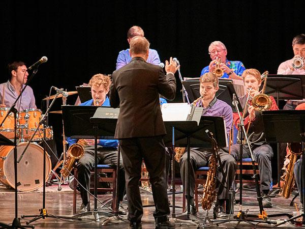 Professor Glenn Cashman conducts the concert jazz ensemble.