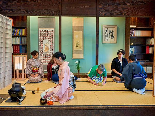 olgate reunion attendees participate in a traditional Japanese Tea Ceremony, hosted at the Japanese Studies Center in Lawrence Hall.
