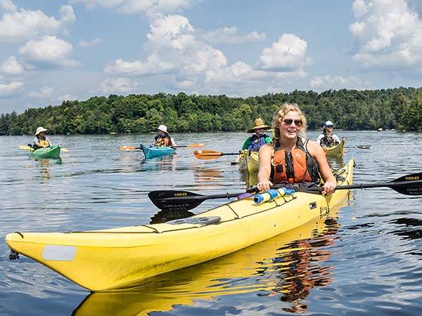 Students kayak as part of Wilderness Adventure with Outdoor Education