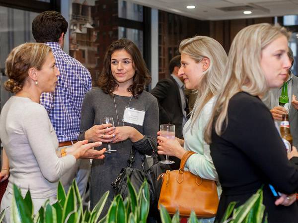 Alumni gather at an event.