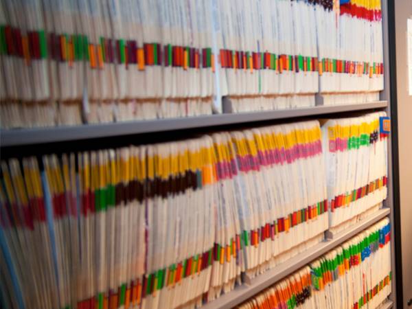 Files on a shelf.