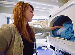 Colgate student doing laundry