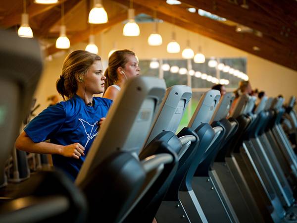 Students running on a treadmill