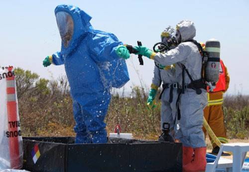 Hazmat team conducting decontamination procedures