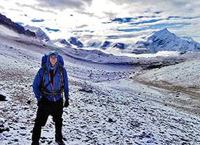Eric Taber '13 in a snowy, mountainous landscape