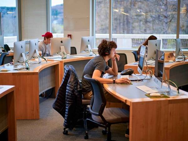 Students work at computers in the Digital Learning and Media Center