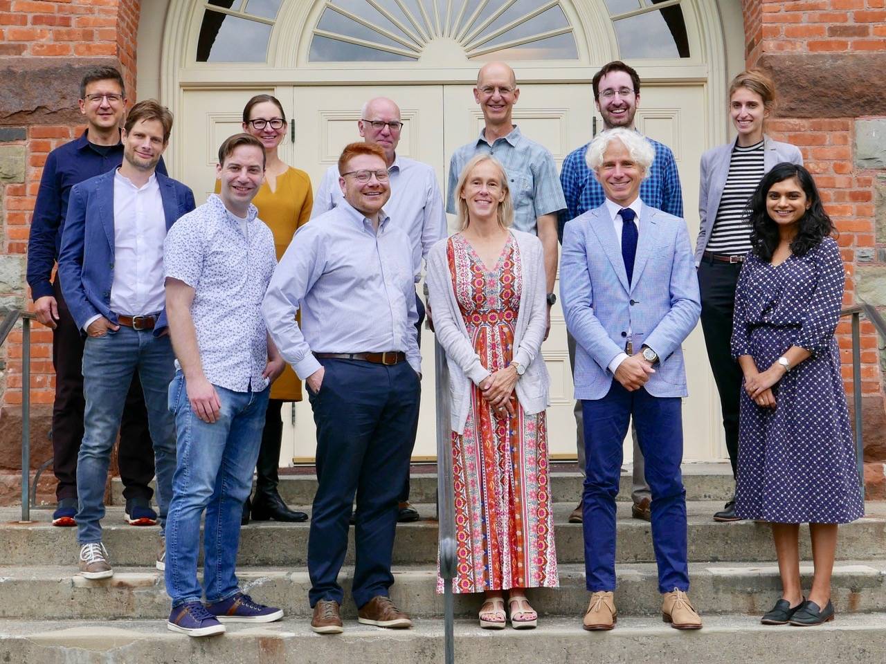 Faculty on Steps of Hascall Hall
