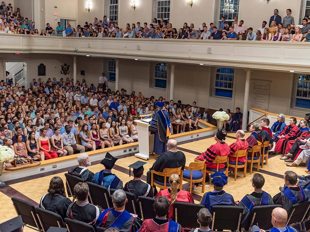 A faculty member addresses the incoming class in Colgate Memorial Chapel