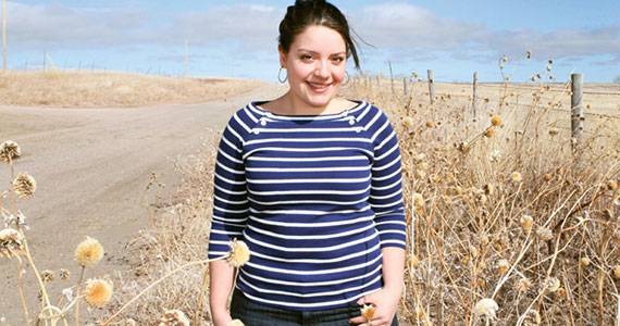 Maggie Dunne standing in rural field