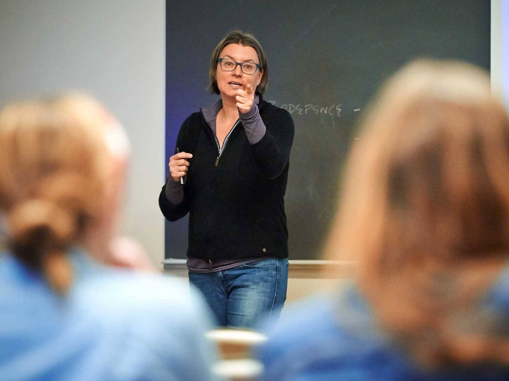 Susan Thomson, assistant professor of peace and conflict studies, teaches a class about Rwanda in CORE 169C (cultures, communities, and identities).