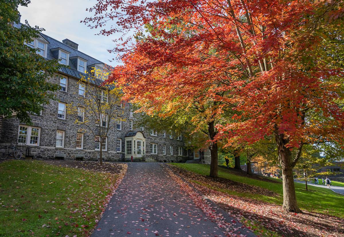 Andrews Hall with fall foliage surrounding it