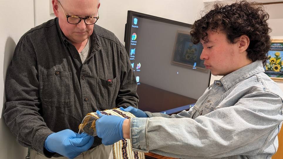 Student works with curatorial staff