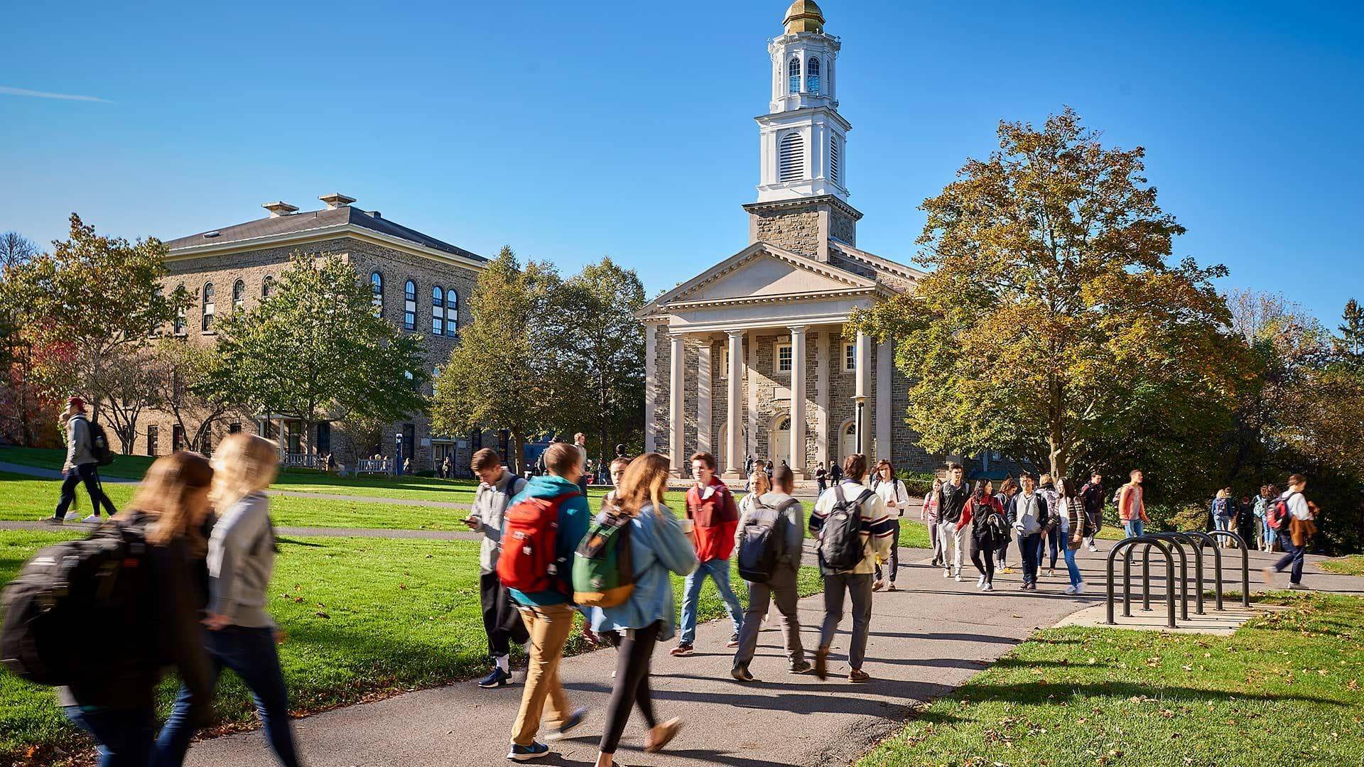 Students waling through the academic quad