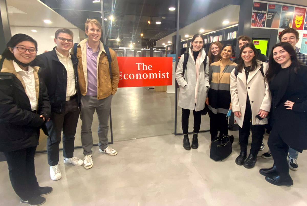 Students pose for picture in The Economist office