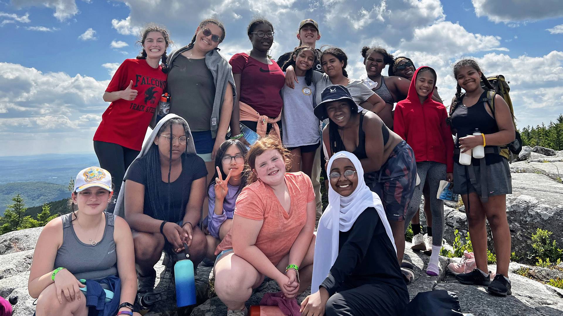 Manzi recipients on a mountain.