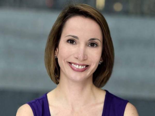 A headshot photo of Liza Benson