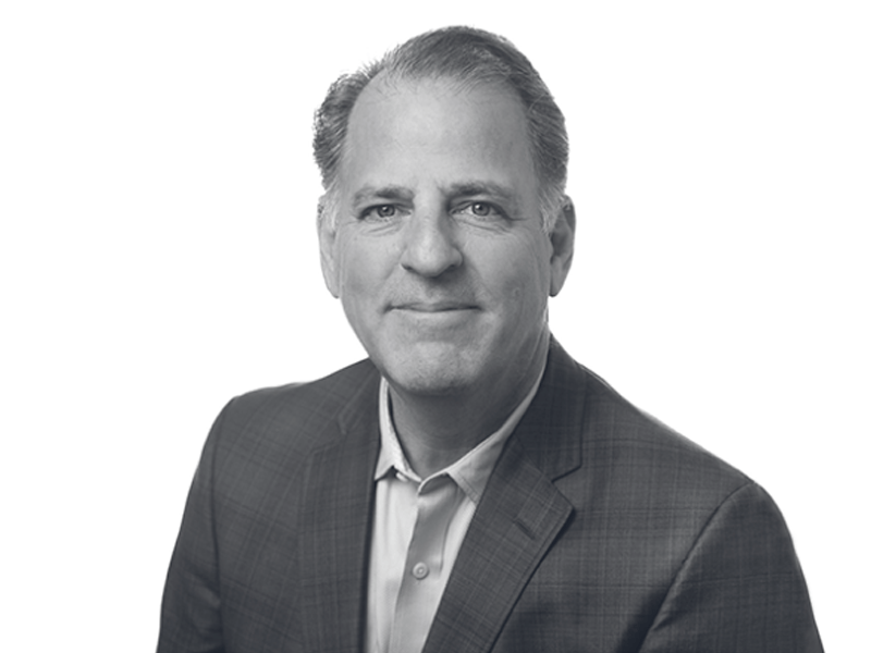 A black and white headshot of Michael Ellenbogen