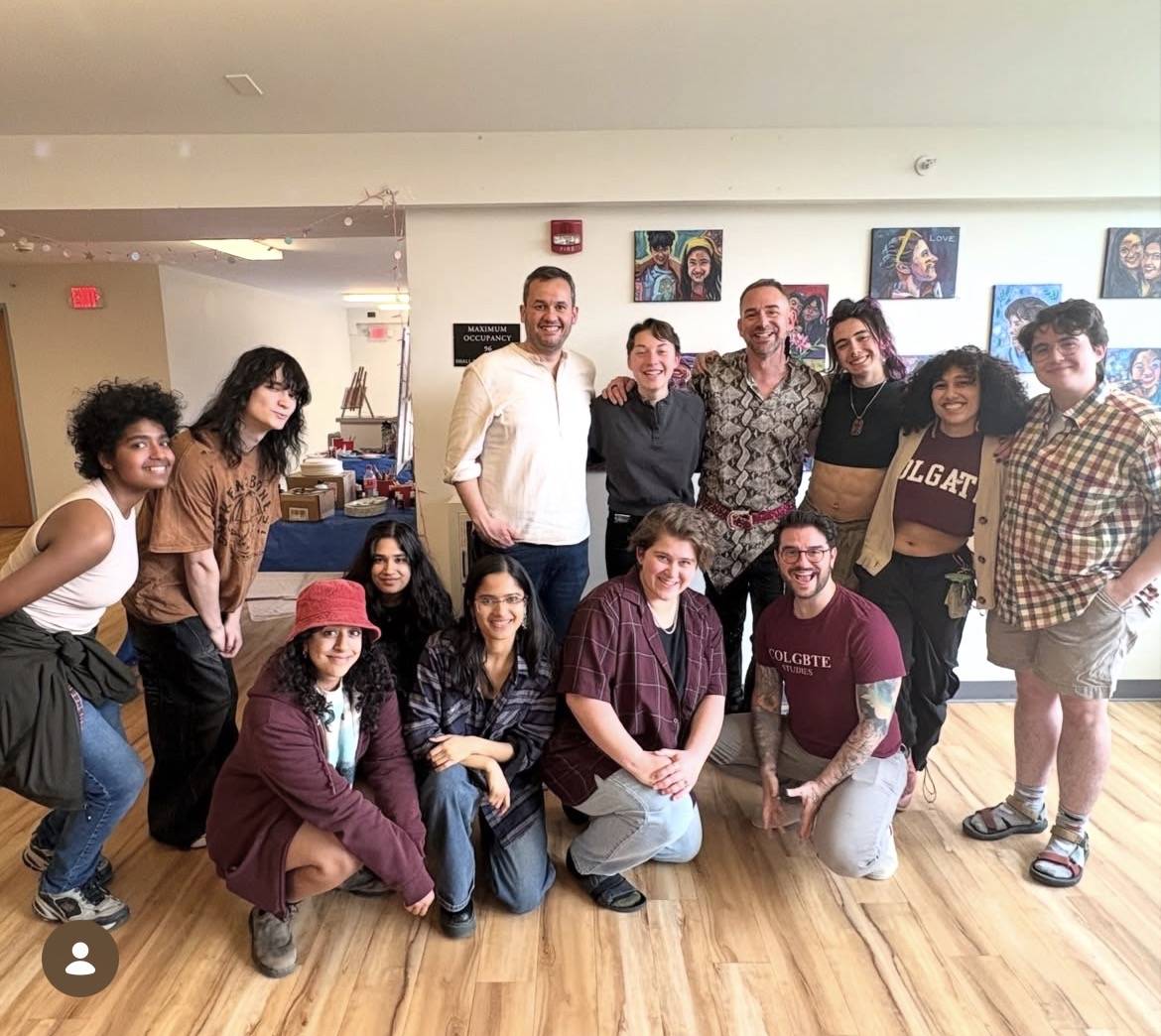 Colgate students and faculty with visiting artists at the Queertopia pop-up art exhibit