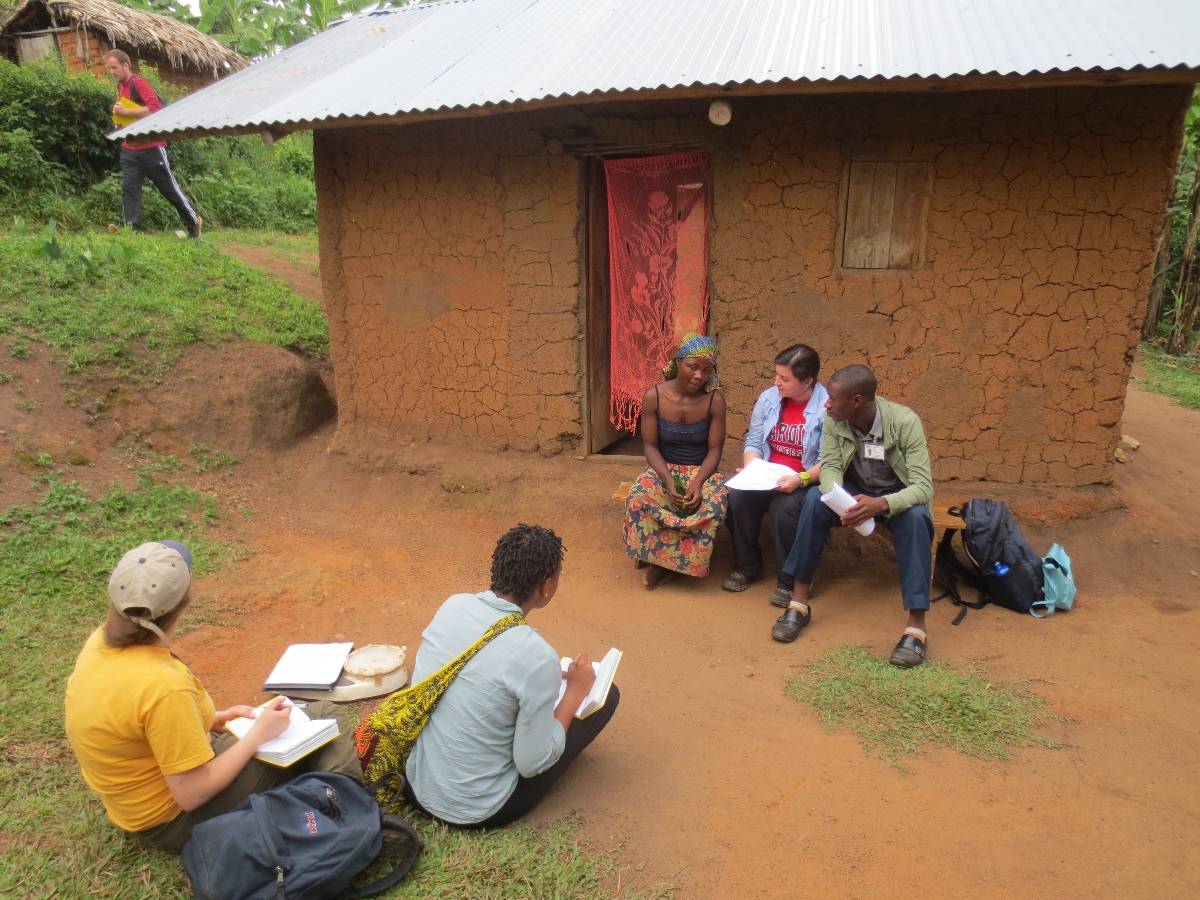 Colgate students administering surveys about food security to families in southwestern Uganda, June 2013