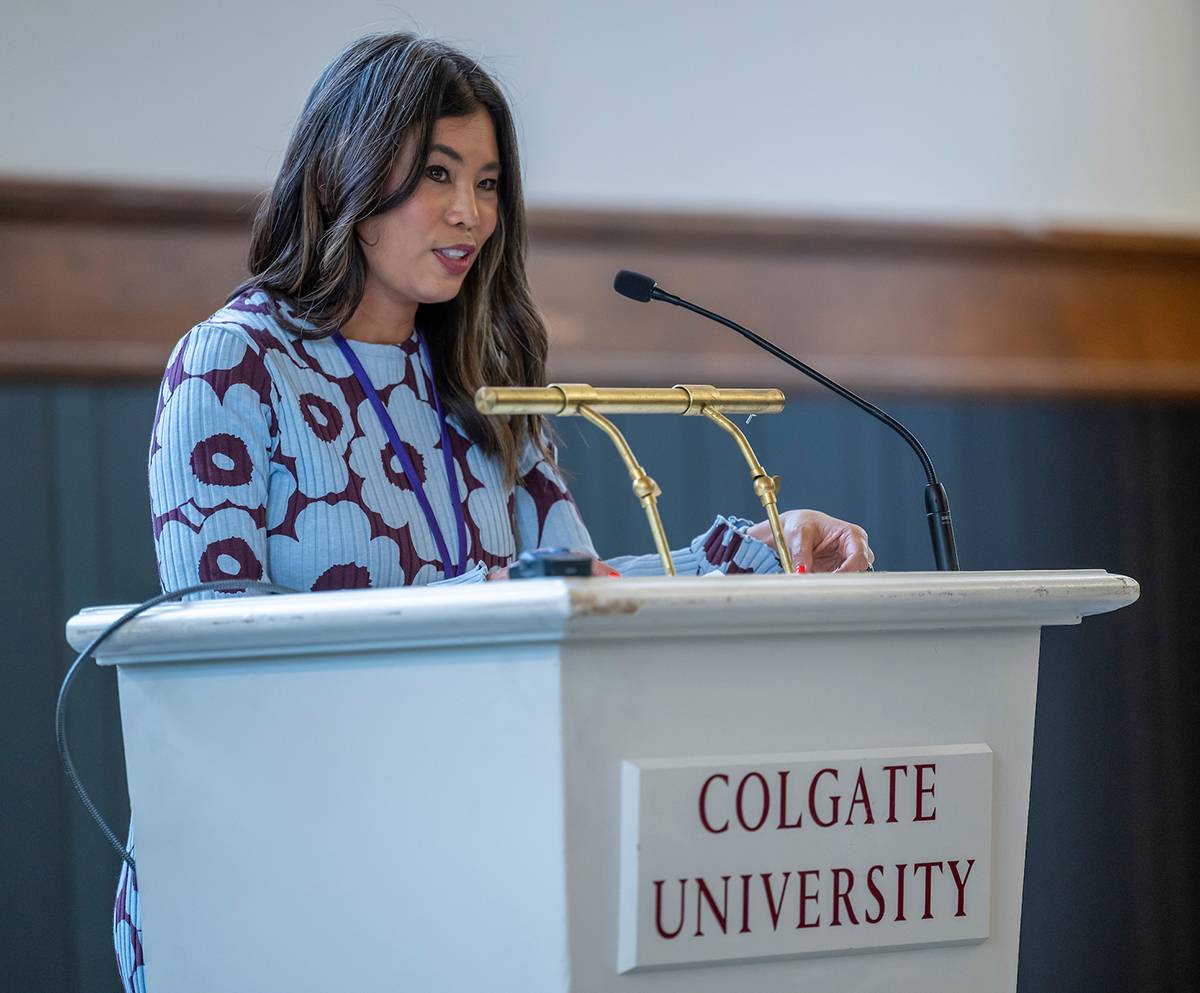 Kanitha Heng Snow ’09 addresses the Colgate Writers Conference in the Hall of Presidents