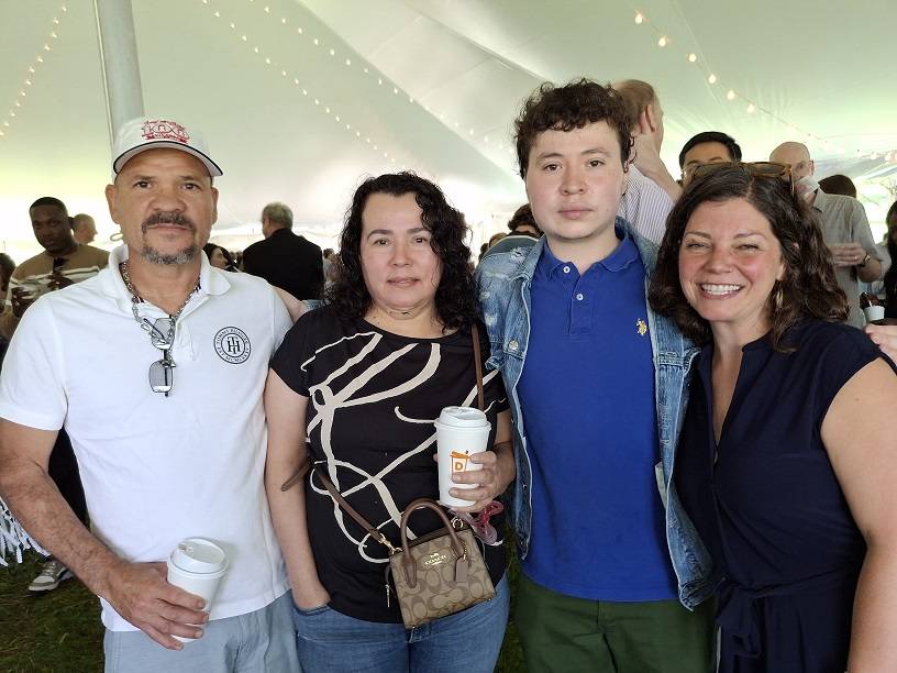 Jose Arriaza ’25 and family with Professor Emily Mitchell-Eaton