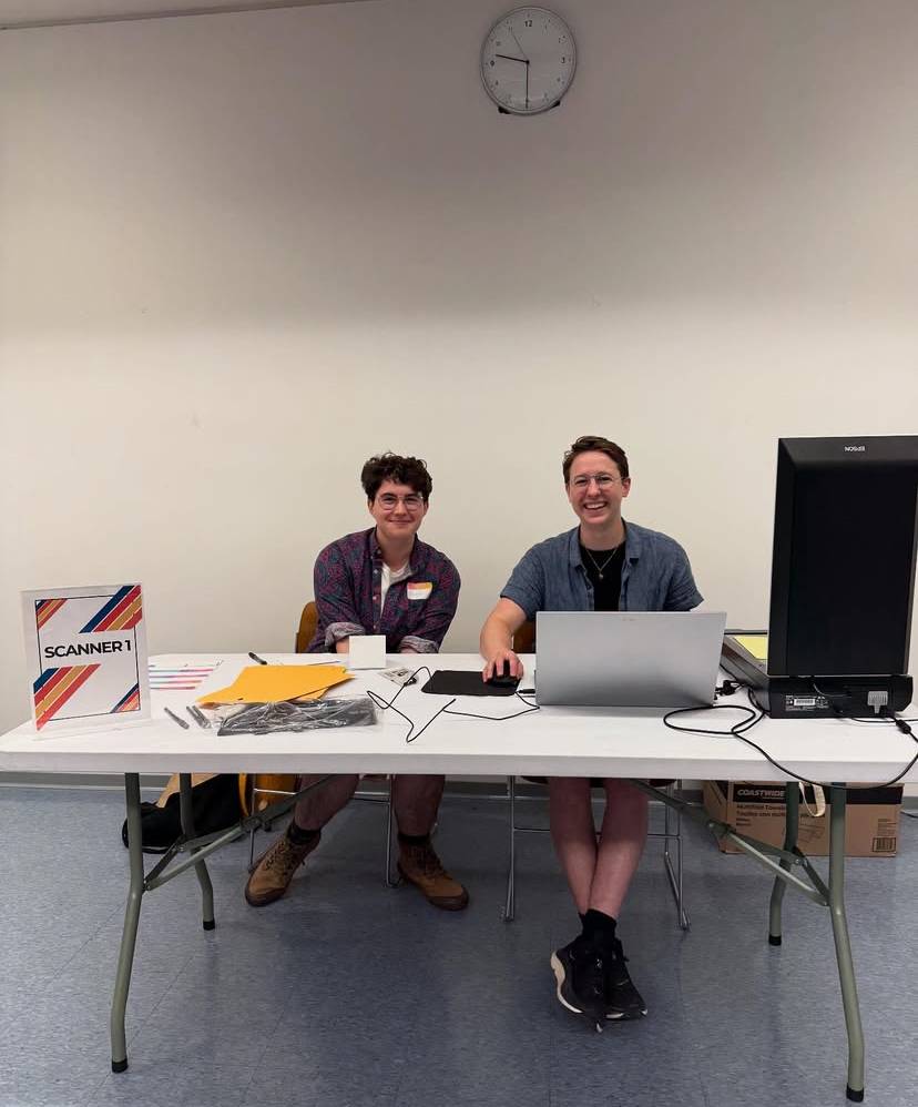 Oscar Brown ’26 (left) interns at Queer History Boston