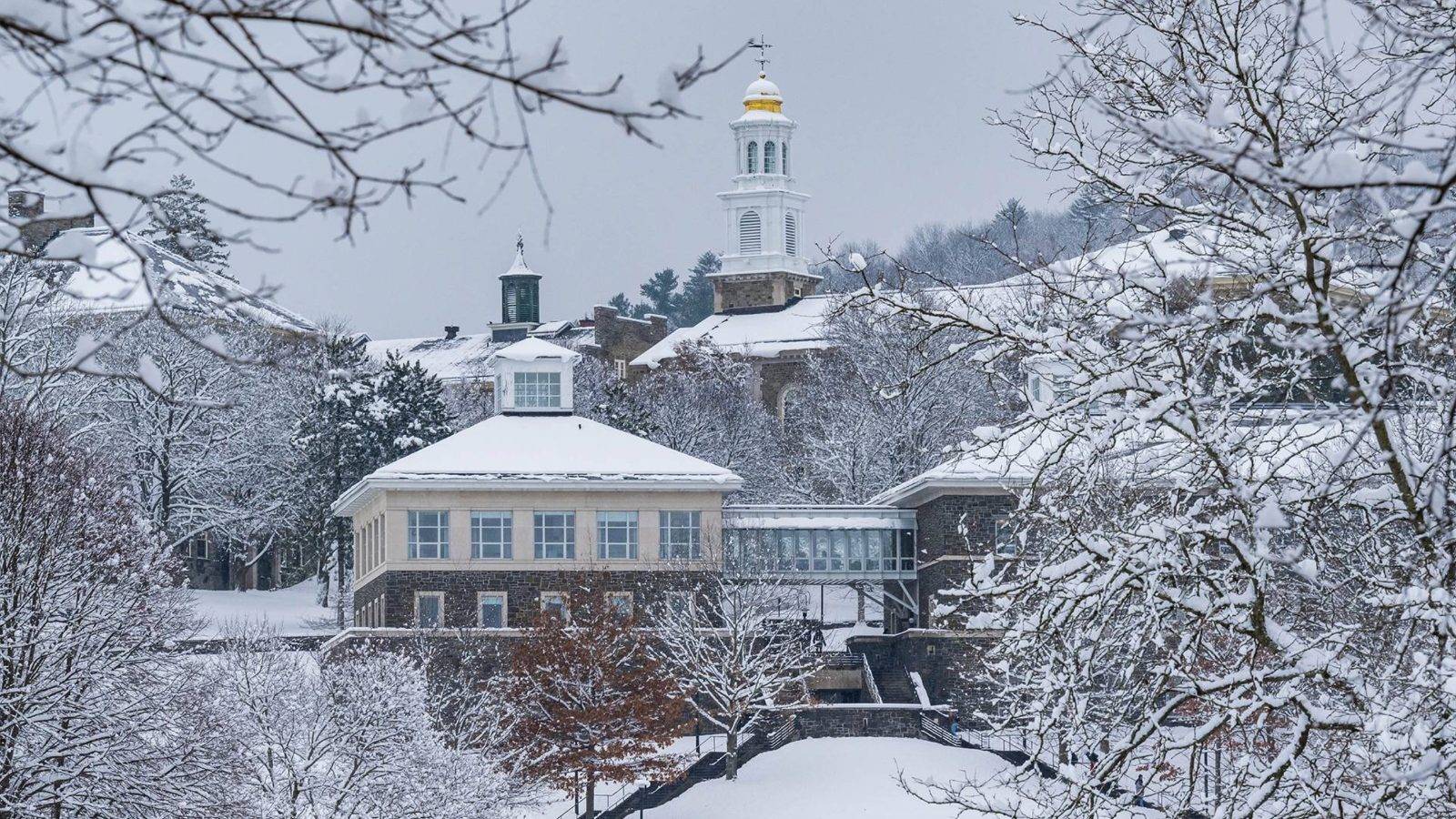 Winter scene of campus looking at Persson Hall.