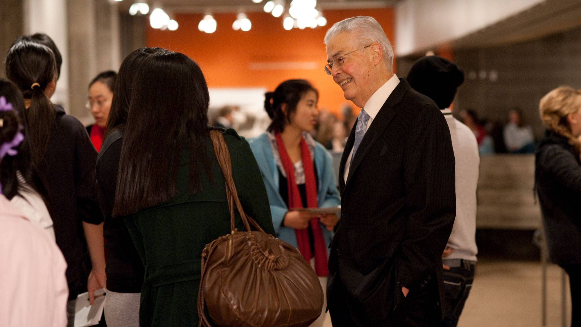 Robert Hung Ngai Ho ’56, H’11 talks with students
