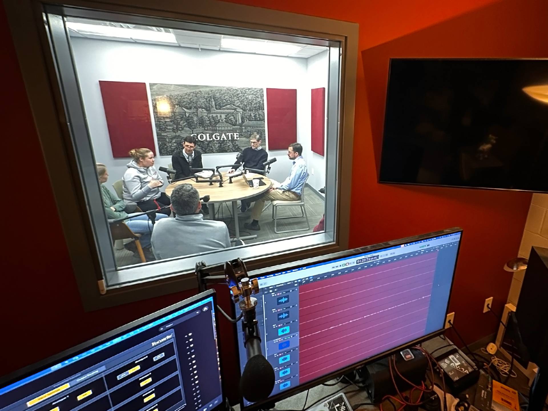 Faculty recording in the studio